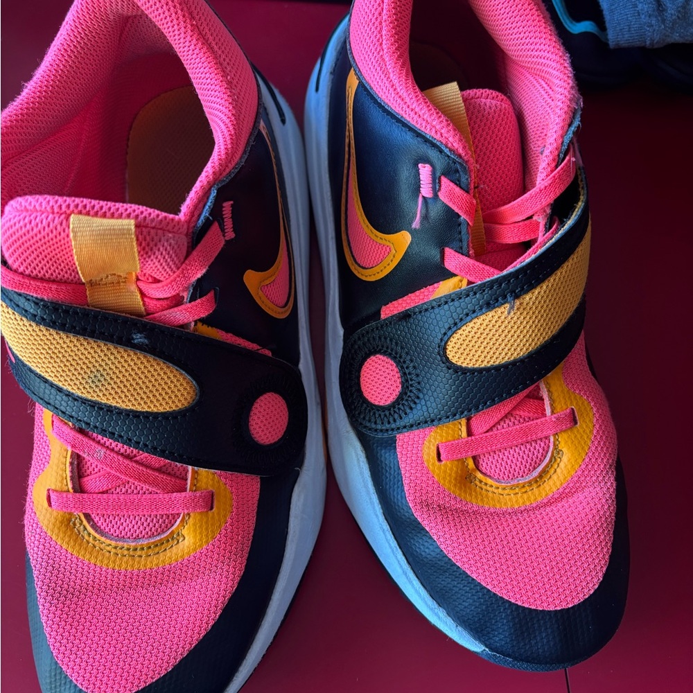 Women’s Nike Pink and Yellow Athletic Sneakers with Black Accents